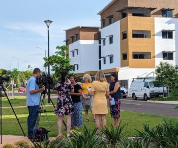 Chief Minister for the NT and Member for Nightcliff Natasha Fyles with Minister for Housing & Homelands Selena Uibo with Venture CEO Karen Walsh on the lawns in the front of the John Stokes Square precinct talking to the media. 